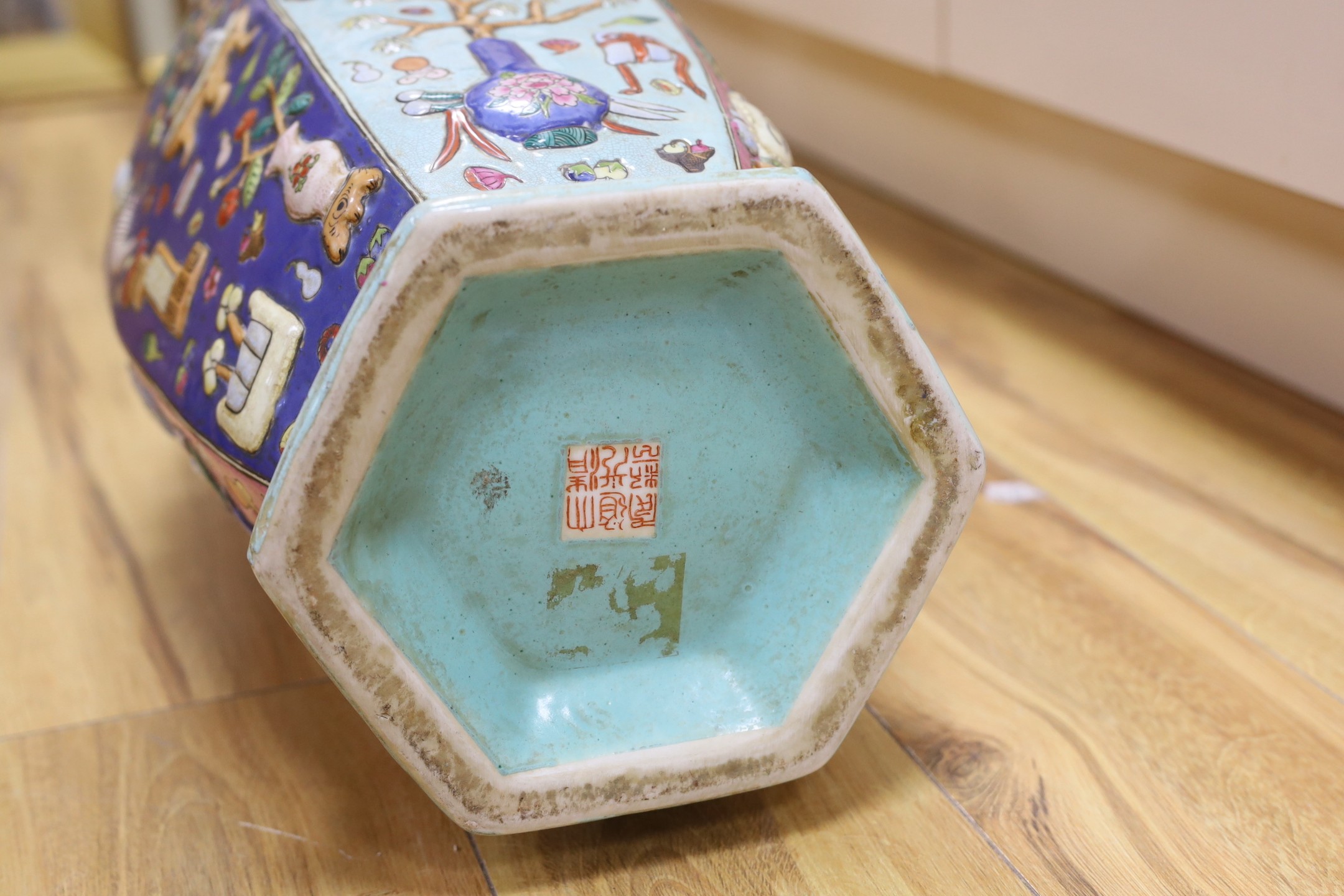 A large Chinese famille rose two handled hexagonal vase. 64cm tall